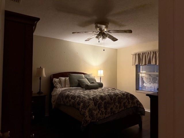 Undisclosed Address Fort Pierce, FL 34951 - Photo 10 of 10 a bedroom with a bed and a chandelier