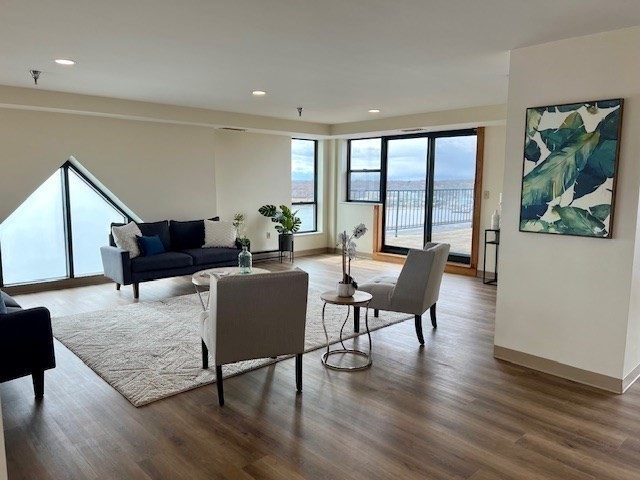750 Davol Street, Unit 1214 Fall River, MA 02720 - Photo 18 of 42 a living room with furniture and a large window