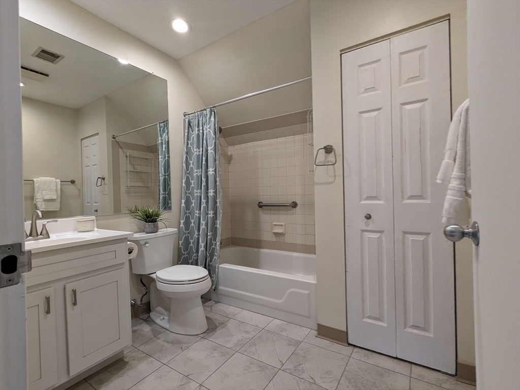 750 Davol Street, Unit 1214 Fall River, MA 02720 - Photo 29 of 42 a bathroom with a sink toilet and shower