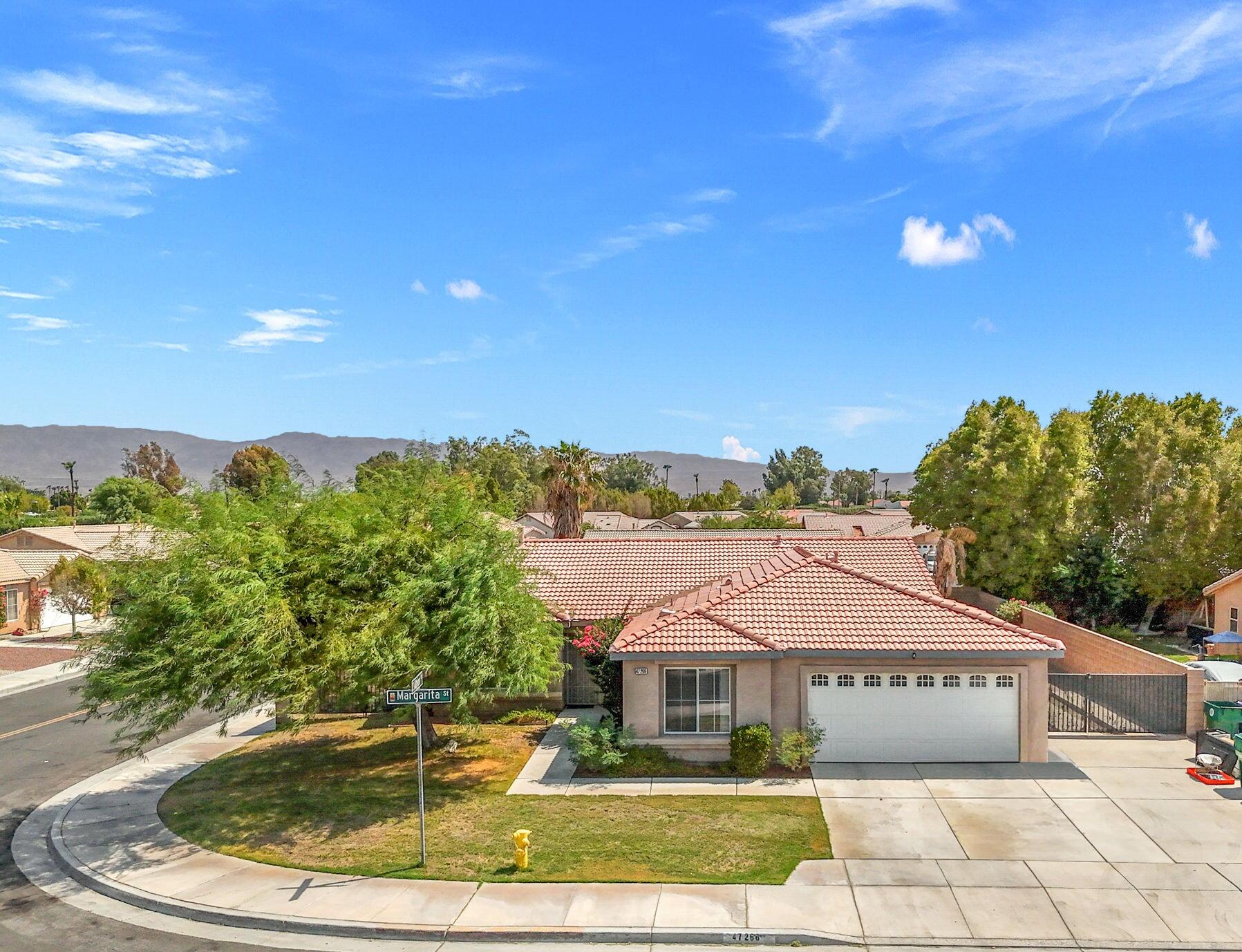 47266 Margarita Street Indio, CA 92201 - Photo 2 of 26 12-web-or-mls-DJI_20240906115141_0100_D