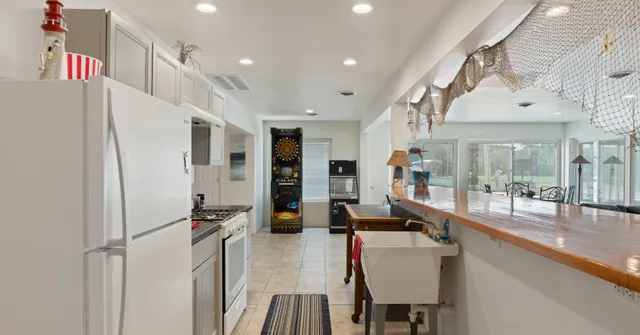 a room with furniture and a view of living room