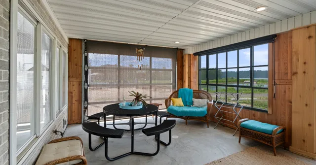 a living room filled with furniture