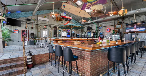 a view of a chairs and tables in a restaurant