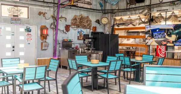 a view of city with a table and chairs