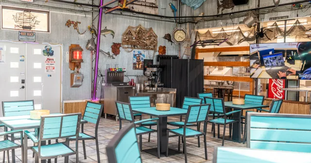 a view of city with a table and chairs