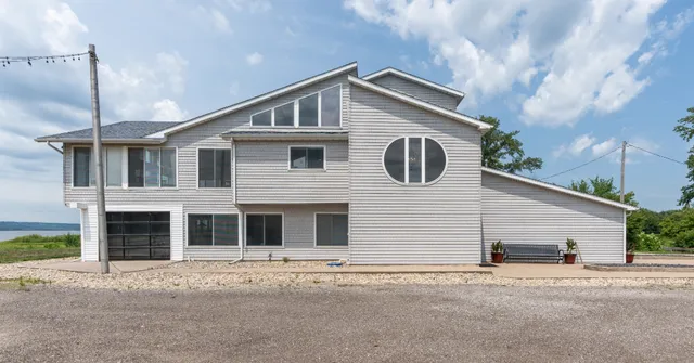 a front view of a house with a garage