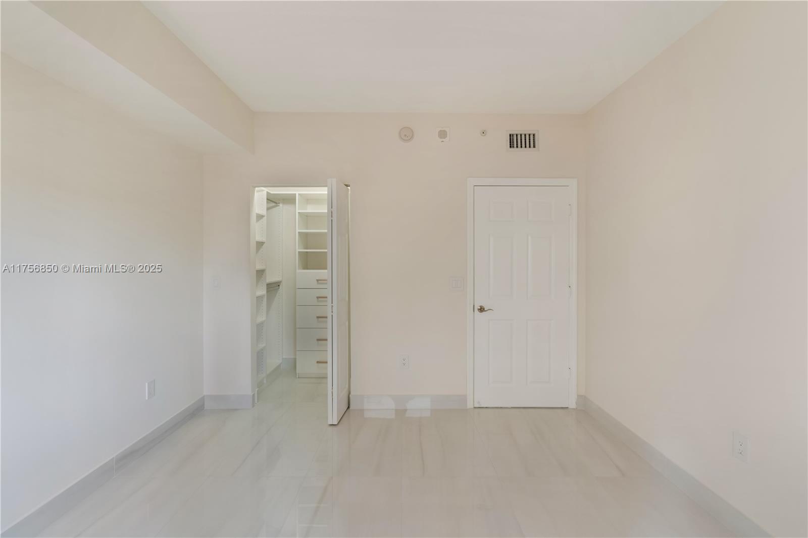 888 Douglas Road, Unit 404 Coral Gables, FL 33134 - Photo 11 of 21 a view of an empty room