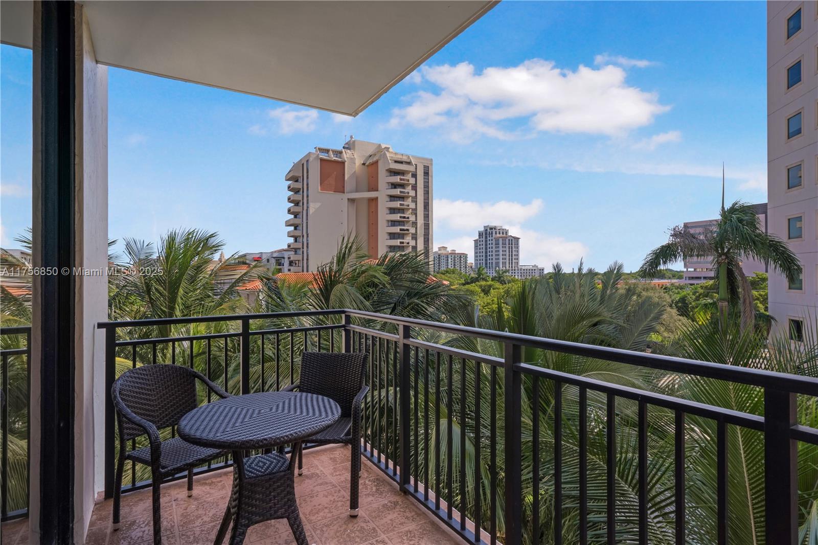 888 Douglas Road, Unit 404 Coral Gables, FL 33134 - Photo 17 of 21 a view of a balcony with furniture