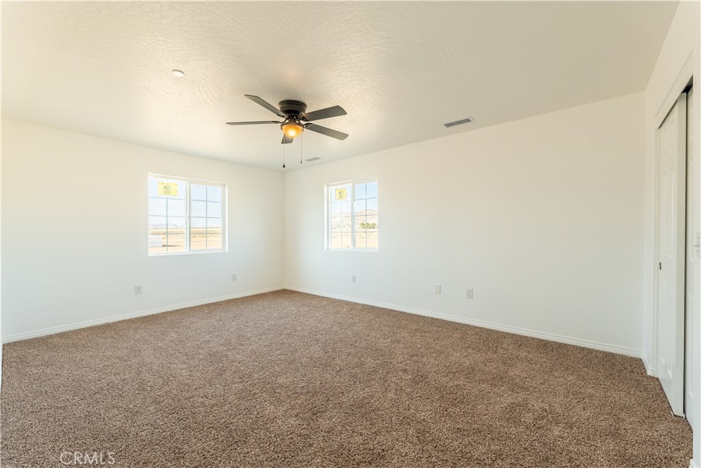 16925 Nanticoke Road Apple Valley, CA 92307 - Photo 76 of 87 a view of an empty room with a window