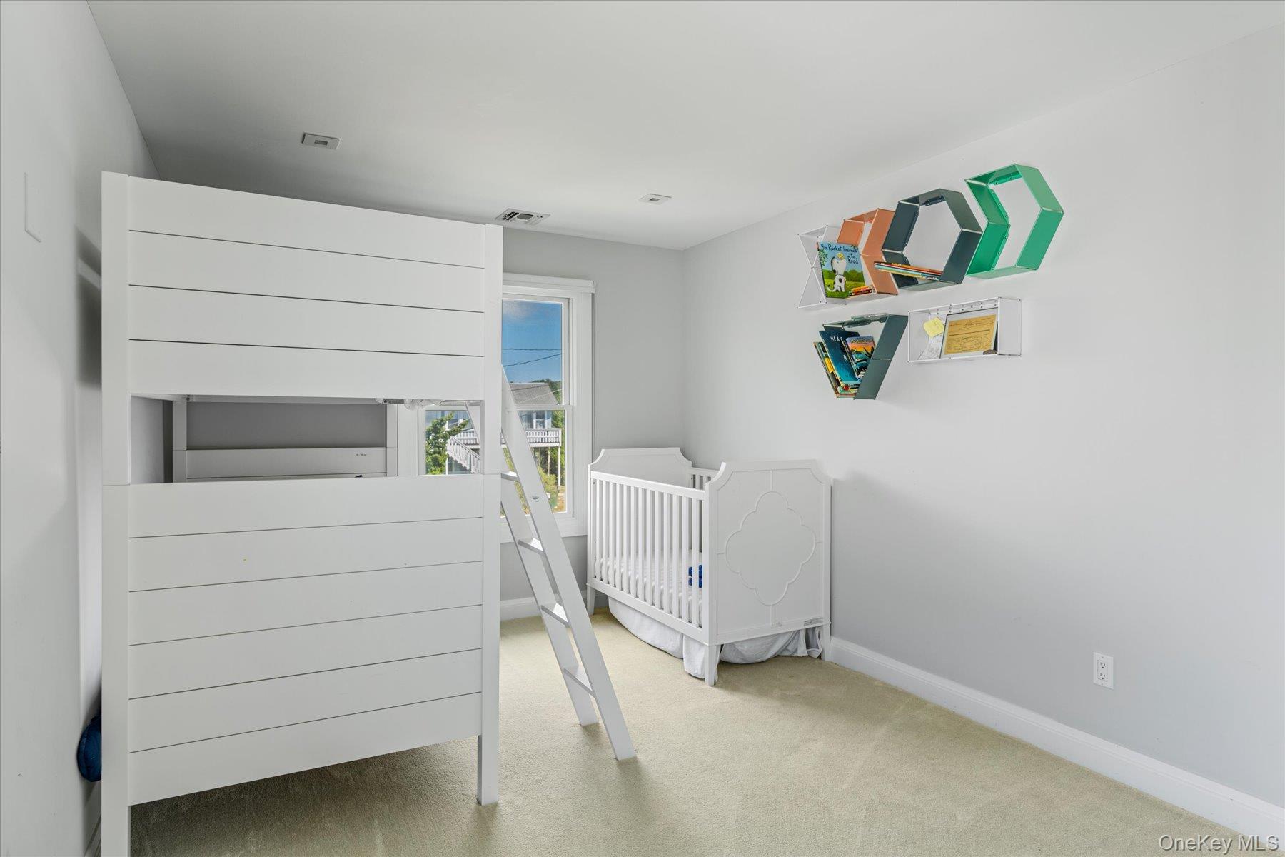 4415 Camp Mineola Road Mattituck, NY 11952 - Photo 17 of 44 Comfortable and spacious guest bedroom.
