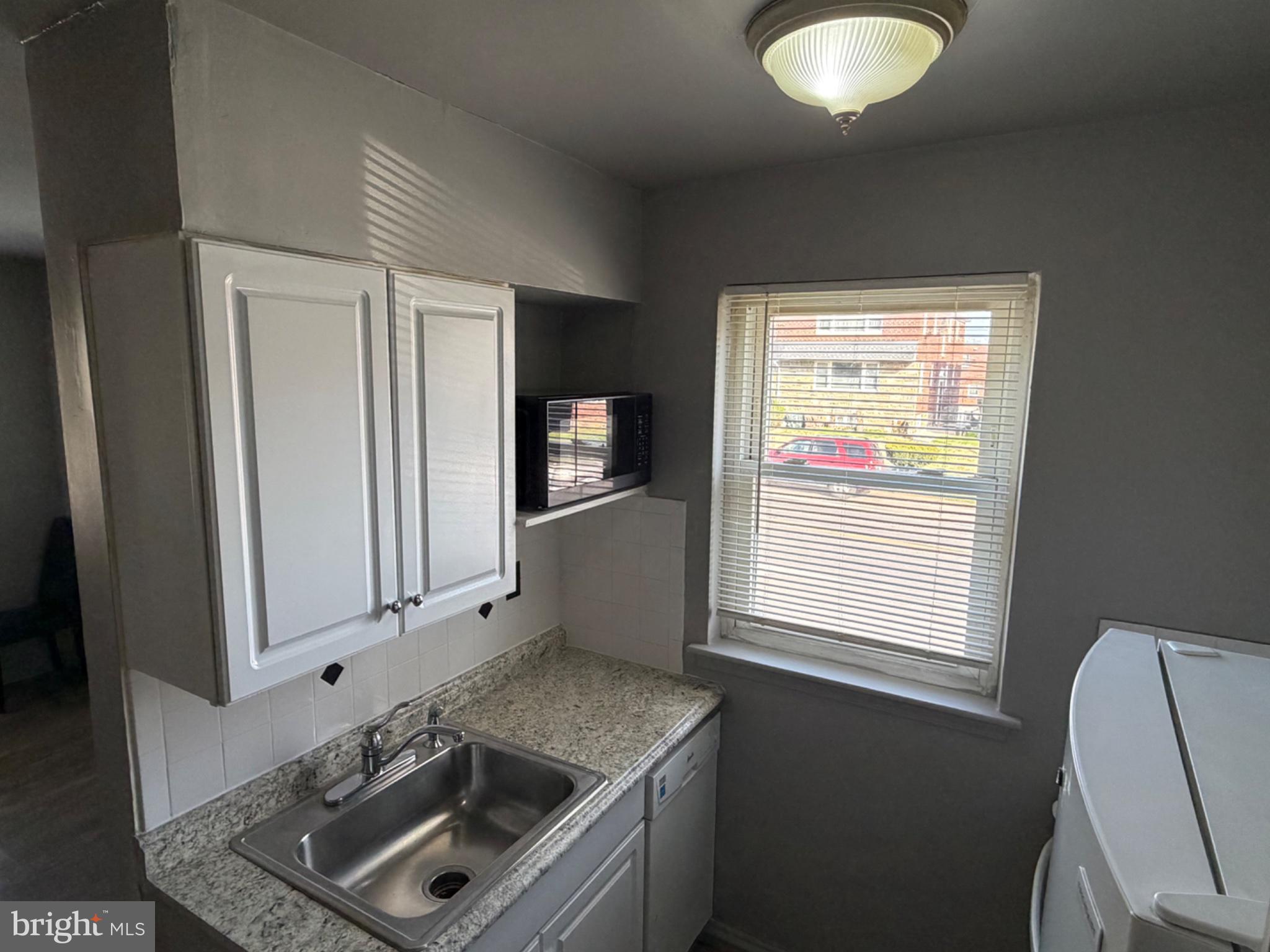 8300 Lynnewood Road Philadelphia, PA 19150 - Photo 9 of 11 Bright and functional kitchen space.