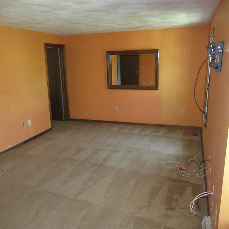 52 Apache Way, Unit 52 Tewksbury, MA 01876 - Photo 15 of 19 a view of a room with a door