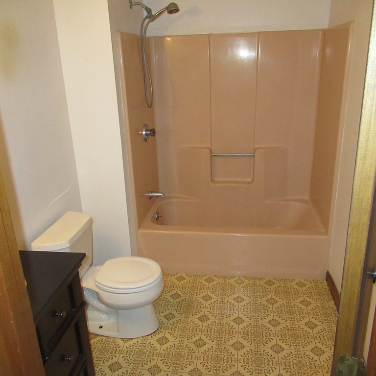 52 Apache Way, Unit 52 Tewksbury, MA 01876 - Photo 17 of 19 a bathroom with a toilet and a shower