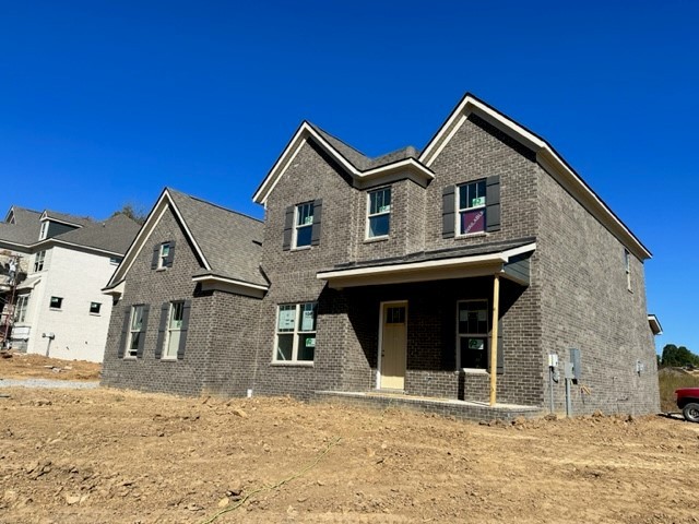 3229 Chase Point Drive Franklin, TN 37067 - Photo 2 of 8 a front view of a house with a yard