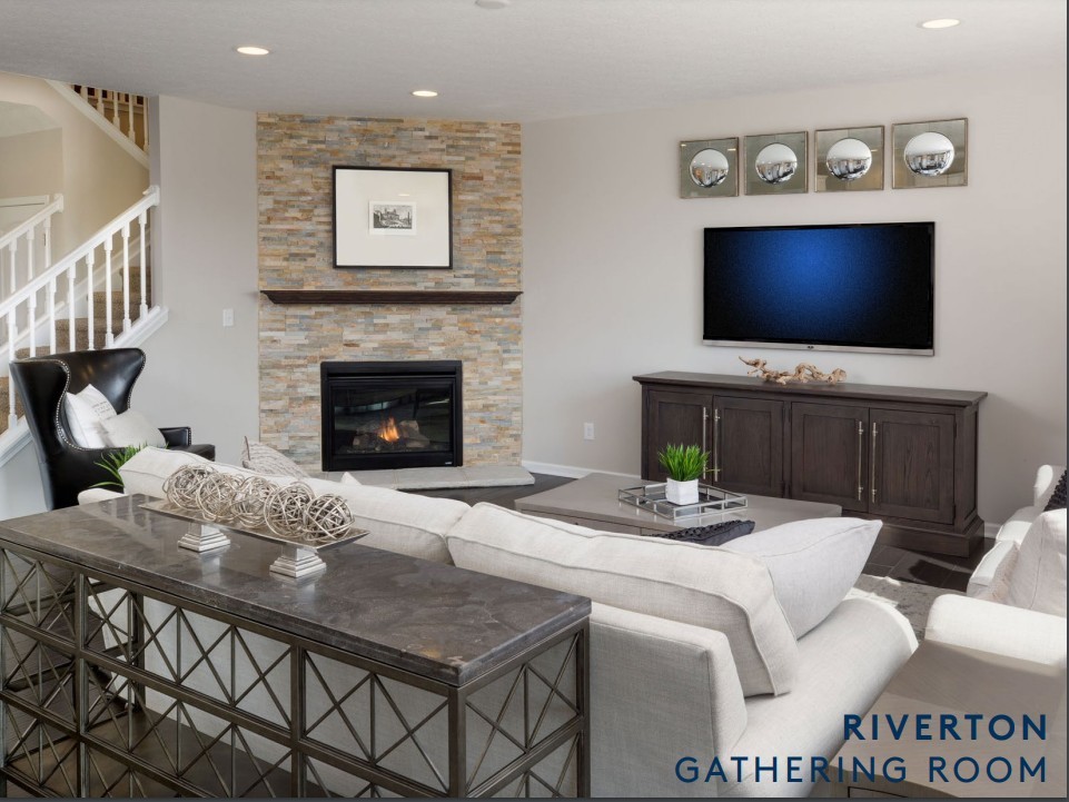 3229 Chase Point Drive Franklin, TN 37067 - Photo 5 of 8 a living room with furniture a flat screen tv and a fireplace