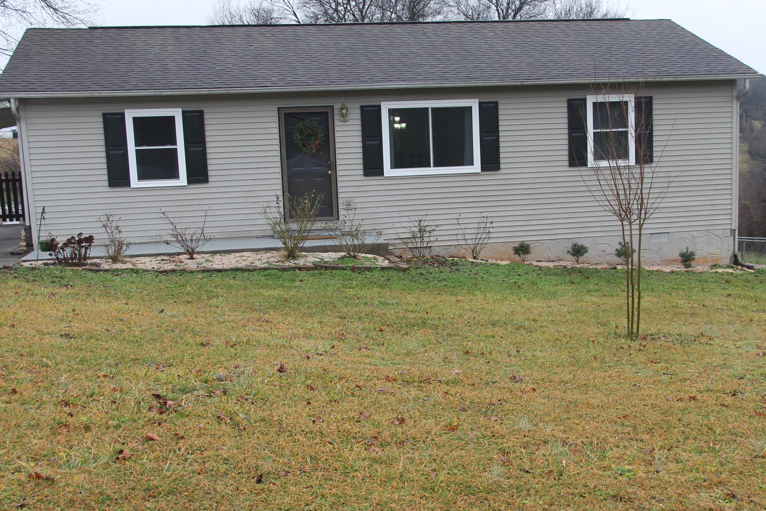 3921 Big Springs Ridge Road Friendsville, TN 37737 - Photo 25 of 27 Landscaped yard