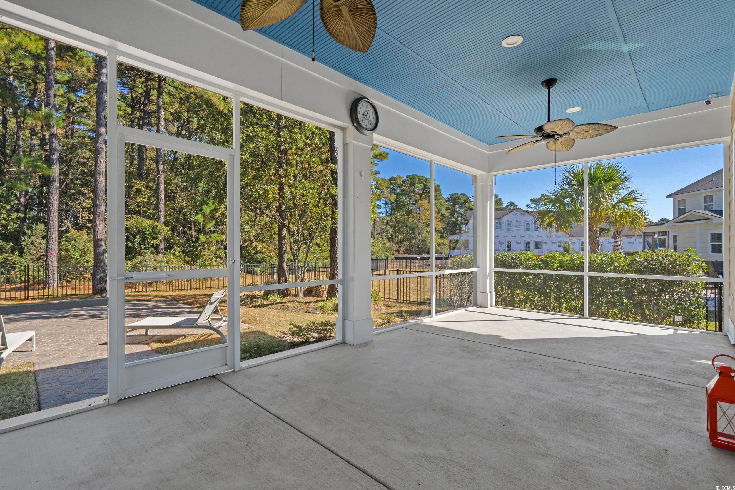 496 Starlit Way Myrtle Beach, SC 29579 - Photo 16 of 40 Unfurnished sunroom with ceiling fan