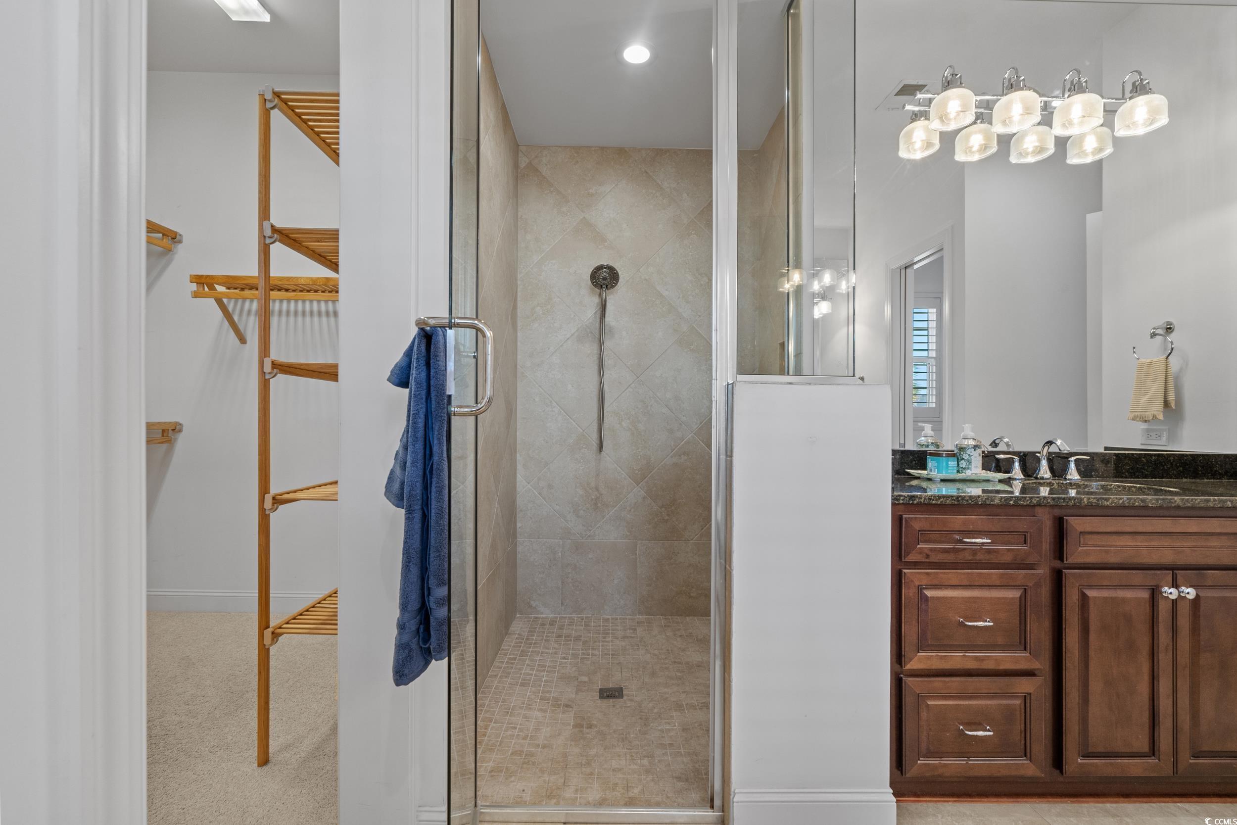 496 Starlit Way Myrtle Beach, SC 29579 - Photo 26 of 40 Bathroom featuring vanity and a stall shower