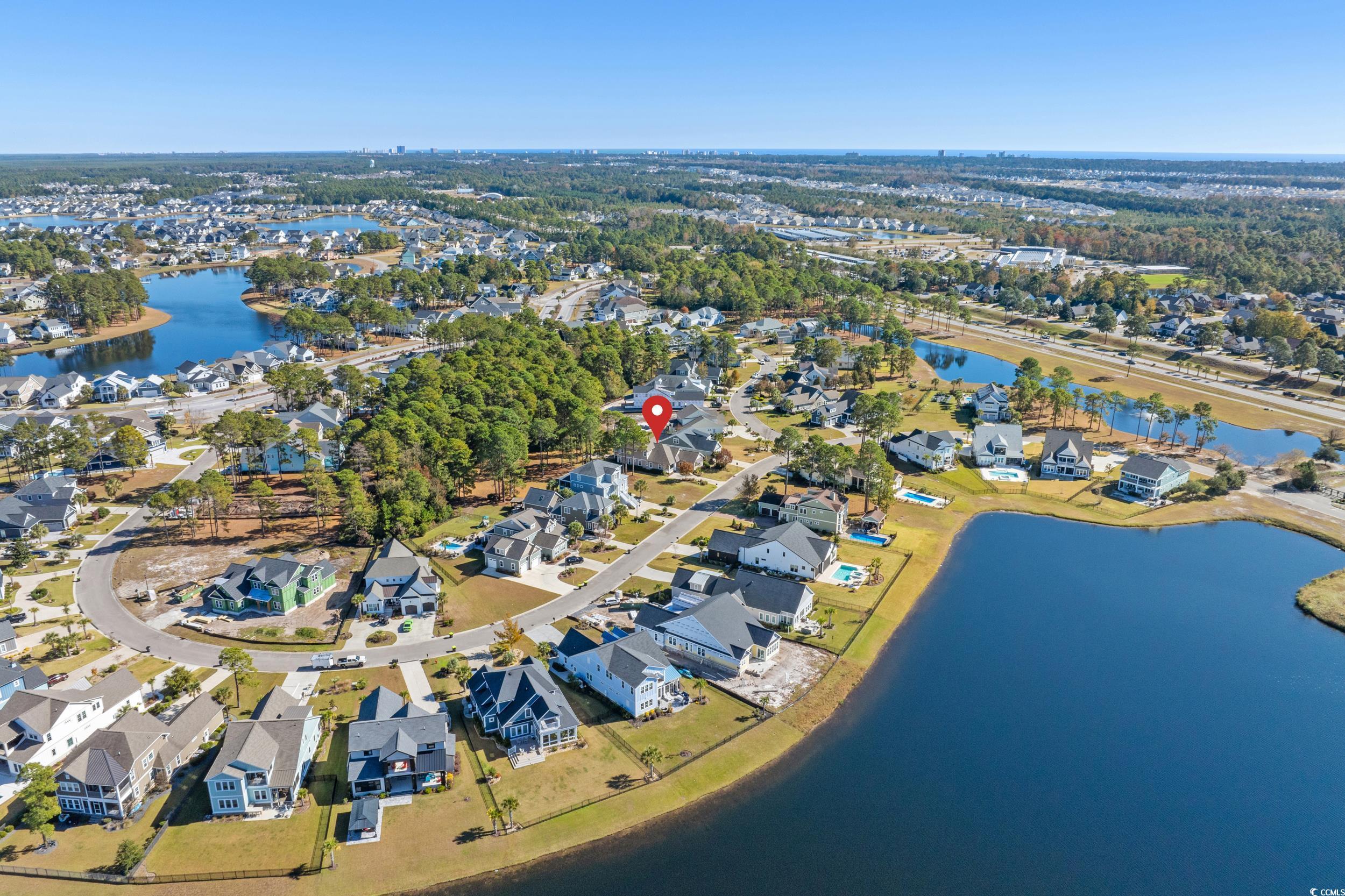 496 Starlit Way Myrtle Beach, SC 29579 - Photo 4 of 40 Aerial view of property's location with a nearby body of water and nearby suburban area