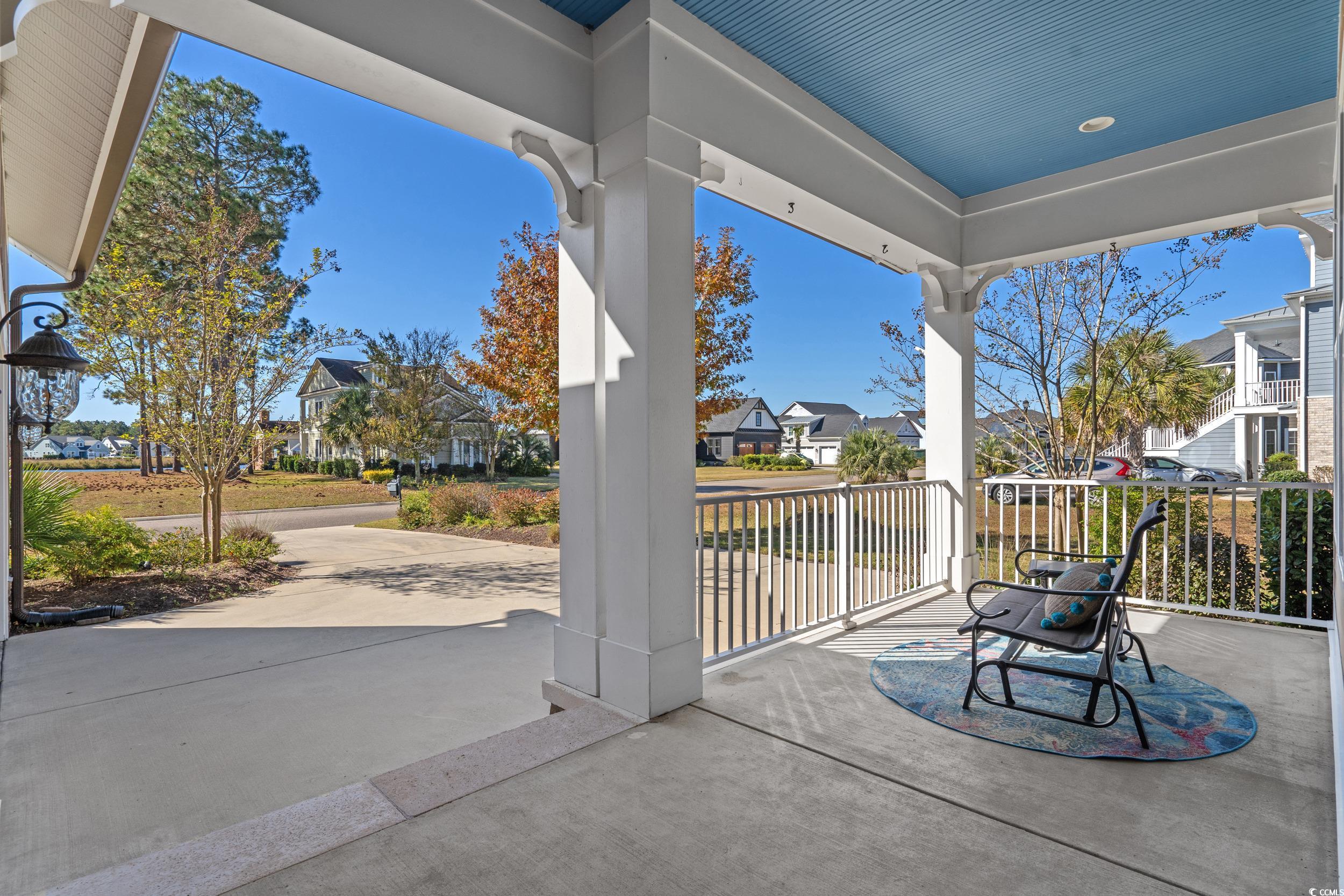 496 Starlit Way Myrtle Beach, SC 29579 - Photo 5 of 40 Covered porch featuring a residential view