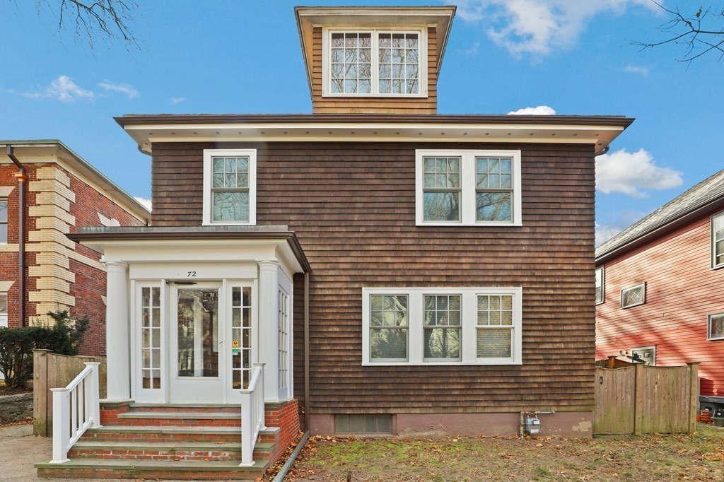 72 Salisbury Road Brookline, MA 02445 - Photo 1 of 40 a view of a house with a door and wooden walls