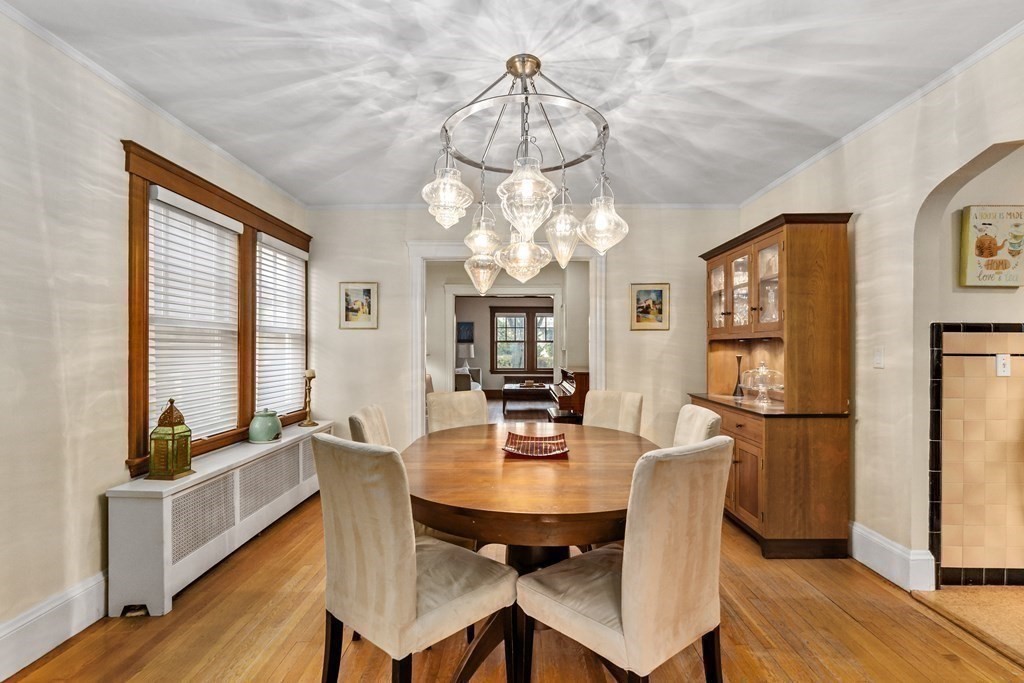 72 Salisbury Road Brookline, MA 02445 - Photo 17 of 40 a view of a dining room with furniture window and wooden floor