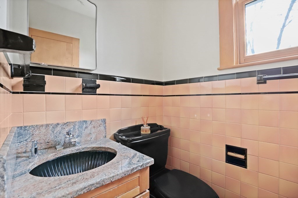 72 Salisbury Road Brookline, MA 02445 - Photo 20 of 40 a kitchen with a sink a stove and cabinets