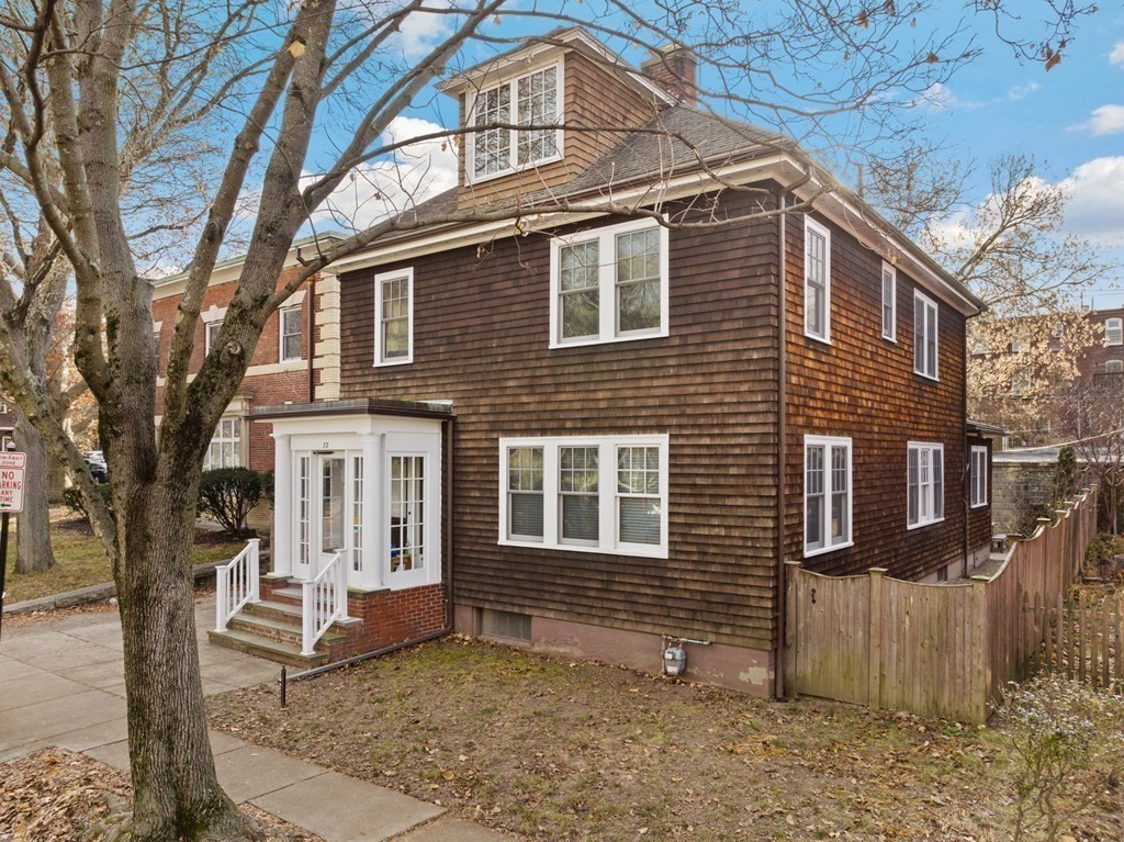 72 Salisbury Road Brookline, MA 02445 - Photo 3 of 40 a front view of a house with a yard