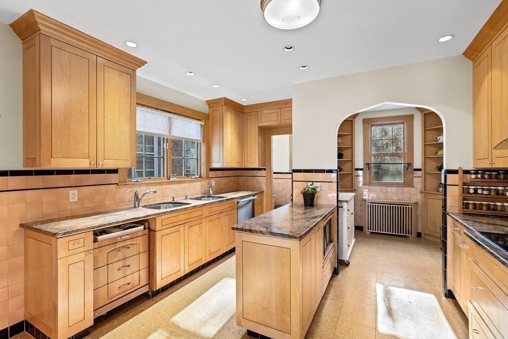 72 Salisbury Road Brookline, MA 02445 - Photo 6 of 40 a large white kitchen with a large window
