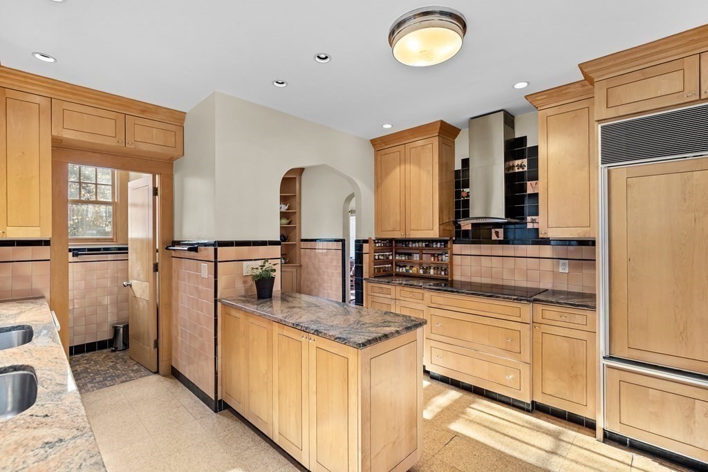 72 Salisbury Road Brookline, MA 02445 - Photo 7 of 40 a kitchen with stainless steel appliances granite countertop a sink and a refrigerator
