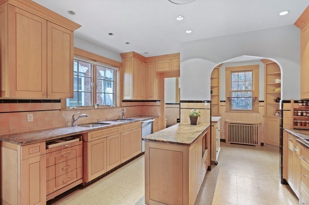 72 Salisbury Road Brookline, MA 02445 - Photo 9 of 40 a kitchen with a sink stove and cabinets