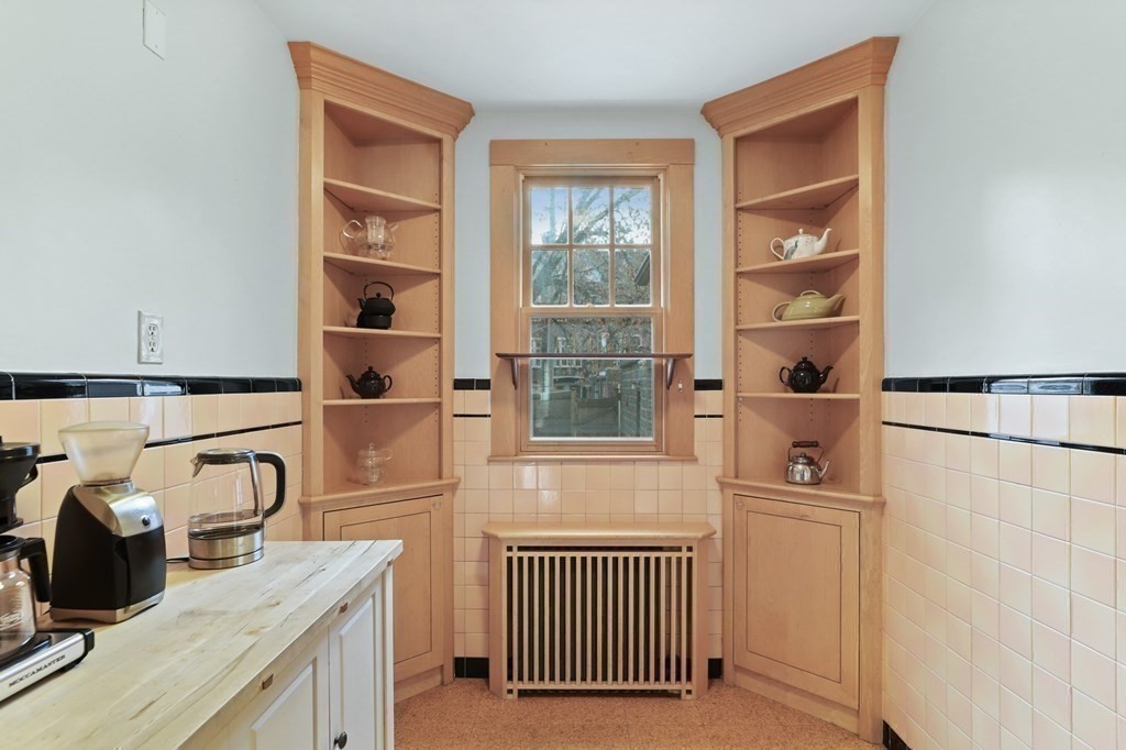 72 Salisbury Road Brookline, MA 02445 - Photo 10 of 40 a kitchen with a refrigerator and a sink