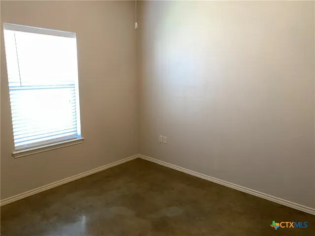 an empty room with a window