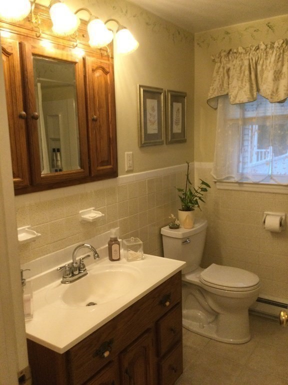 30 Meadow Road Ware, MA 01082 - Photo 16 of 26 a bathroom with a sink mirror and toilet