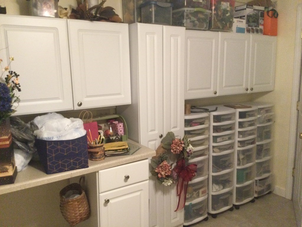 30 Meadow Road Ware, MA 01082 - Photo 17 of 26 a kitchen with a refrigerator and cabinets