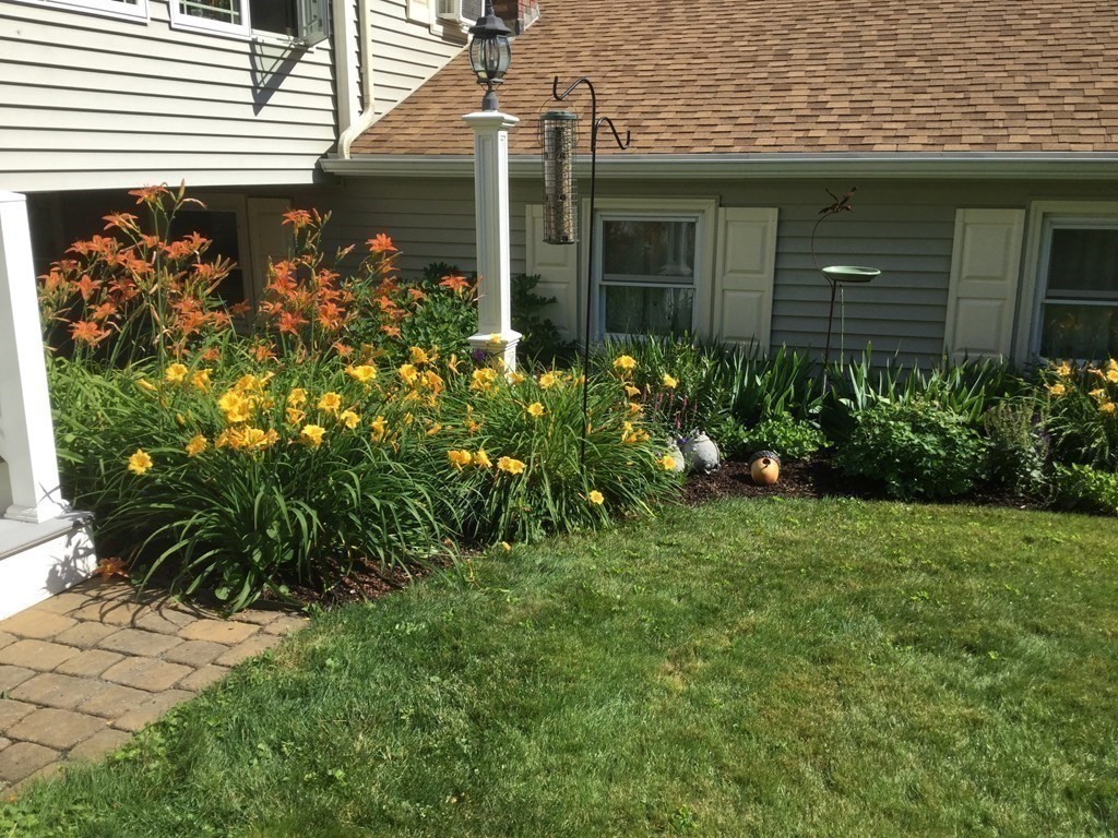 30 Meadow Road Ware, MA 01082 - Photo 24 of 26 a front view of a house with garden