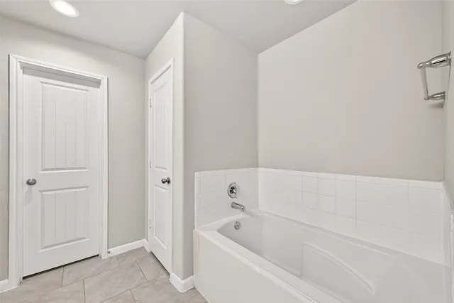 a bathroom with a sink double vanity and a mirror