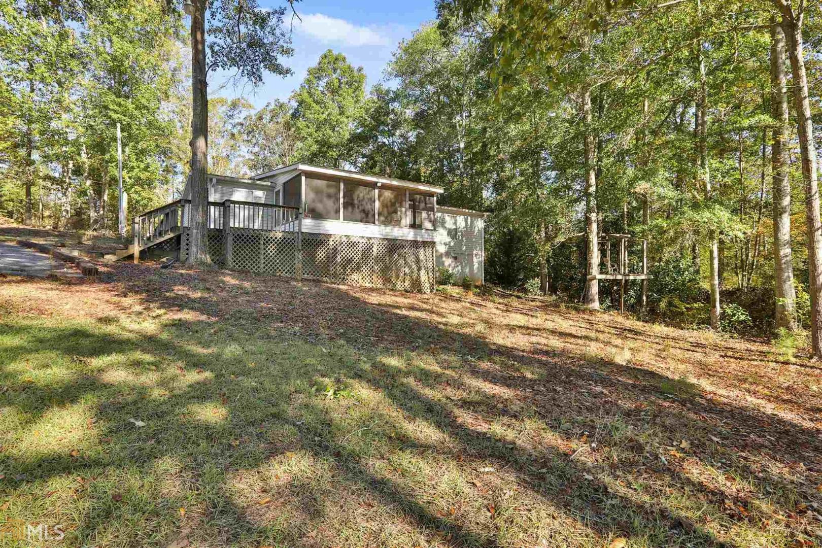 101 Weavers Lakefront Road Jackson, GA 30233 - Photo 1 of 1 a view of a house with a yard