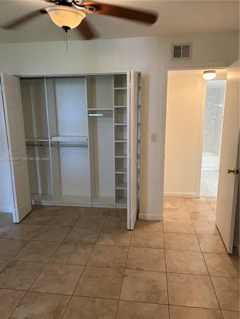 a view of an empty room with a sink