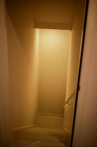 a bathroom with a glass door shower and sink