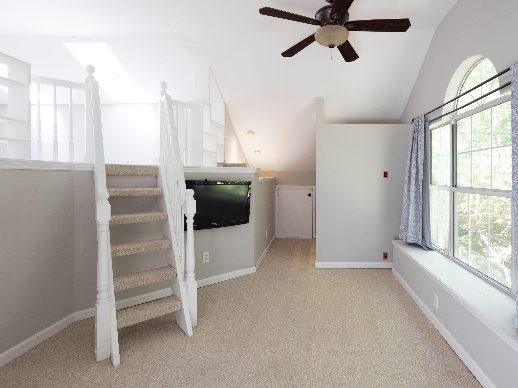 4629 Sandy Creek Road Nashville, TN 37221 - Photo 29 of 48 a view of hallway with window and a ceiling fan