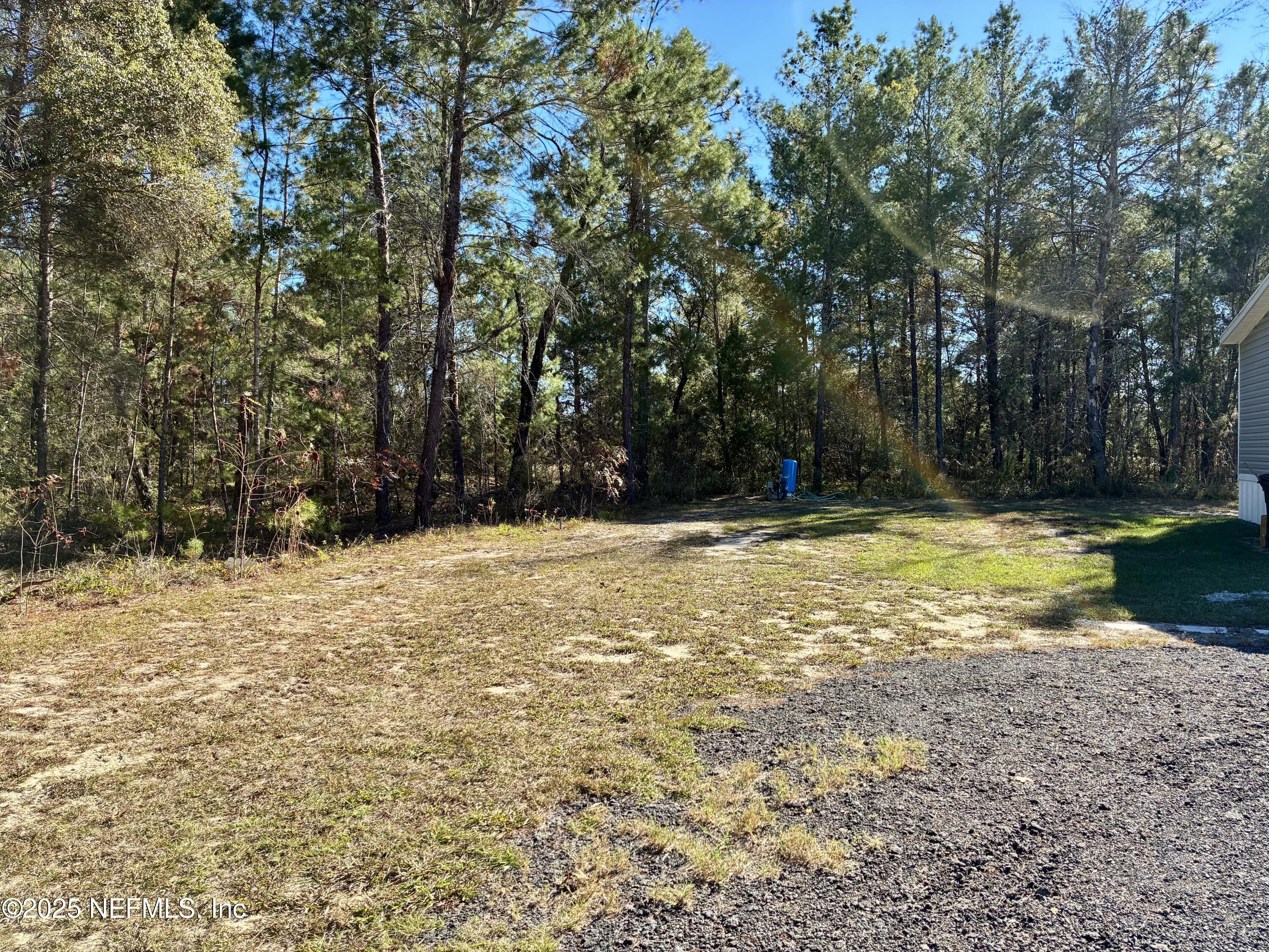 5915 Oak Leaf Road Keystone Heights, FL 32656 - Photo 8 of 44 a view of swimming pool with a yard