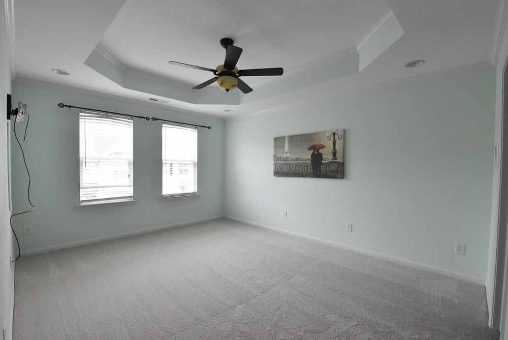 5809 Hourglass Court Raleigh, NC 27612 - Photo 14 of 30 Large Master Bedroom w/tray ceiling, lg WIC, CF and private tiled Bath. Master Bedroom