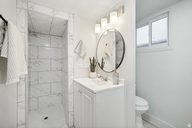 662 29th Street Ogden, UT 84403 - Photo 14 of 23 Walk-in shower with large format tile surround and integrated niche