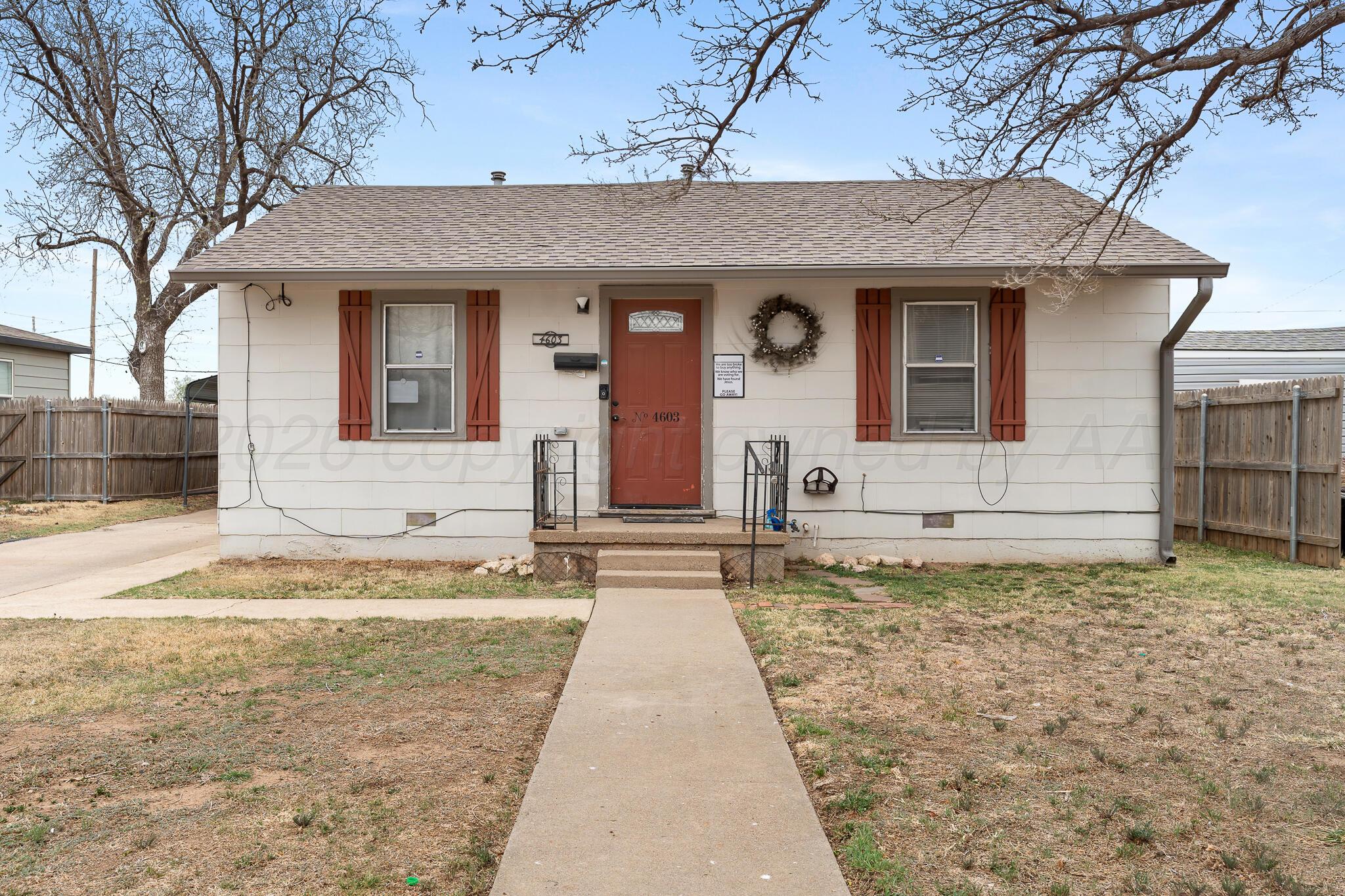 4603 Parker Street Amarillo, TX 79110 - Photo 3 of 20 a front view of a house with a tub