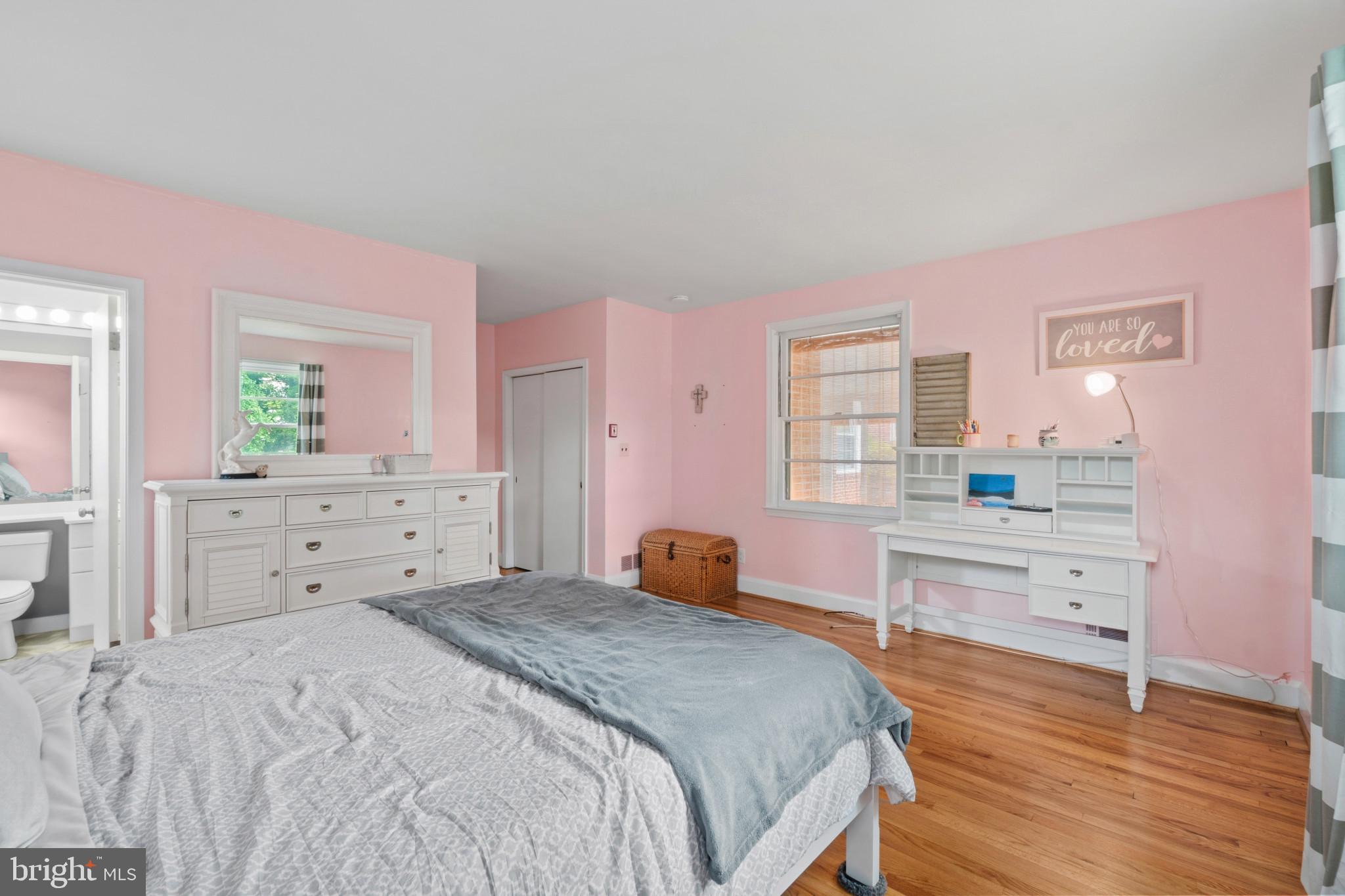 909 Weatherbee Road Towson, MD 21286 - Photo 33 of 51 a bedroom with a bed and a dresser