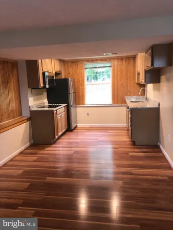 a view of kitchen and microwave