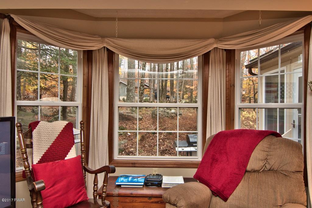 3296 Northgate Road Lake Ariel, PA 18436 - Photo 8 of 33 a living room with furniture and a window