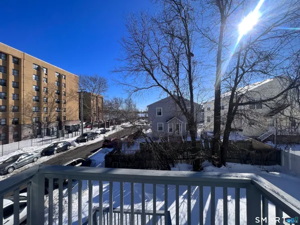 a city view from a balcony