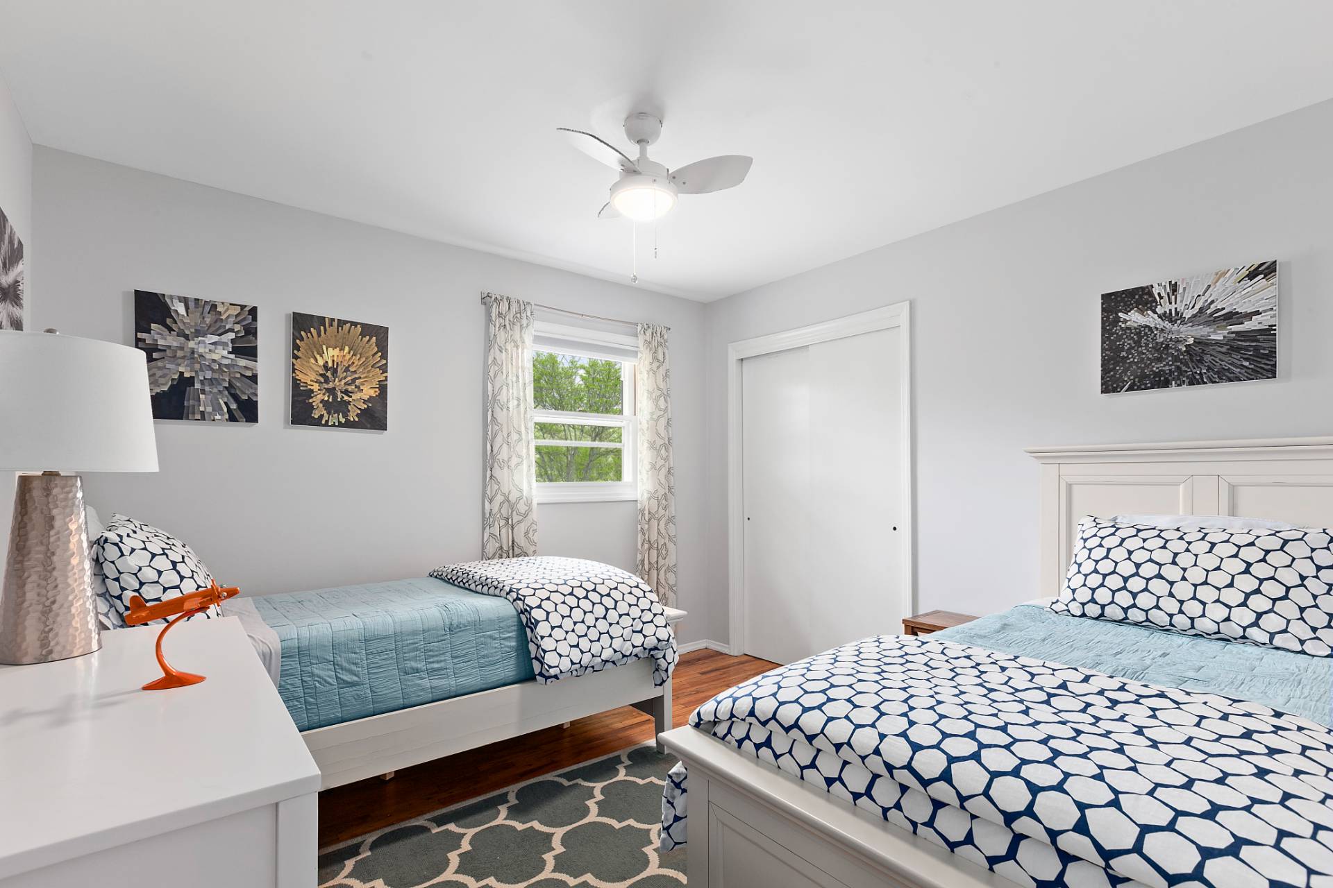26 Whooping Hollow Road East Hampton, NY 11937 - Photo 14 of 18 a bedroom with a bed and wooden floor